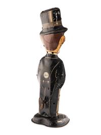 A Group of Three Tin Lithograph Walker Toys
