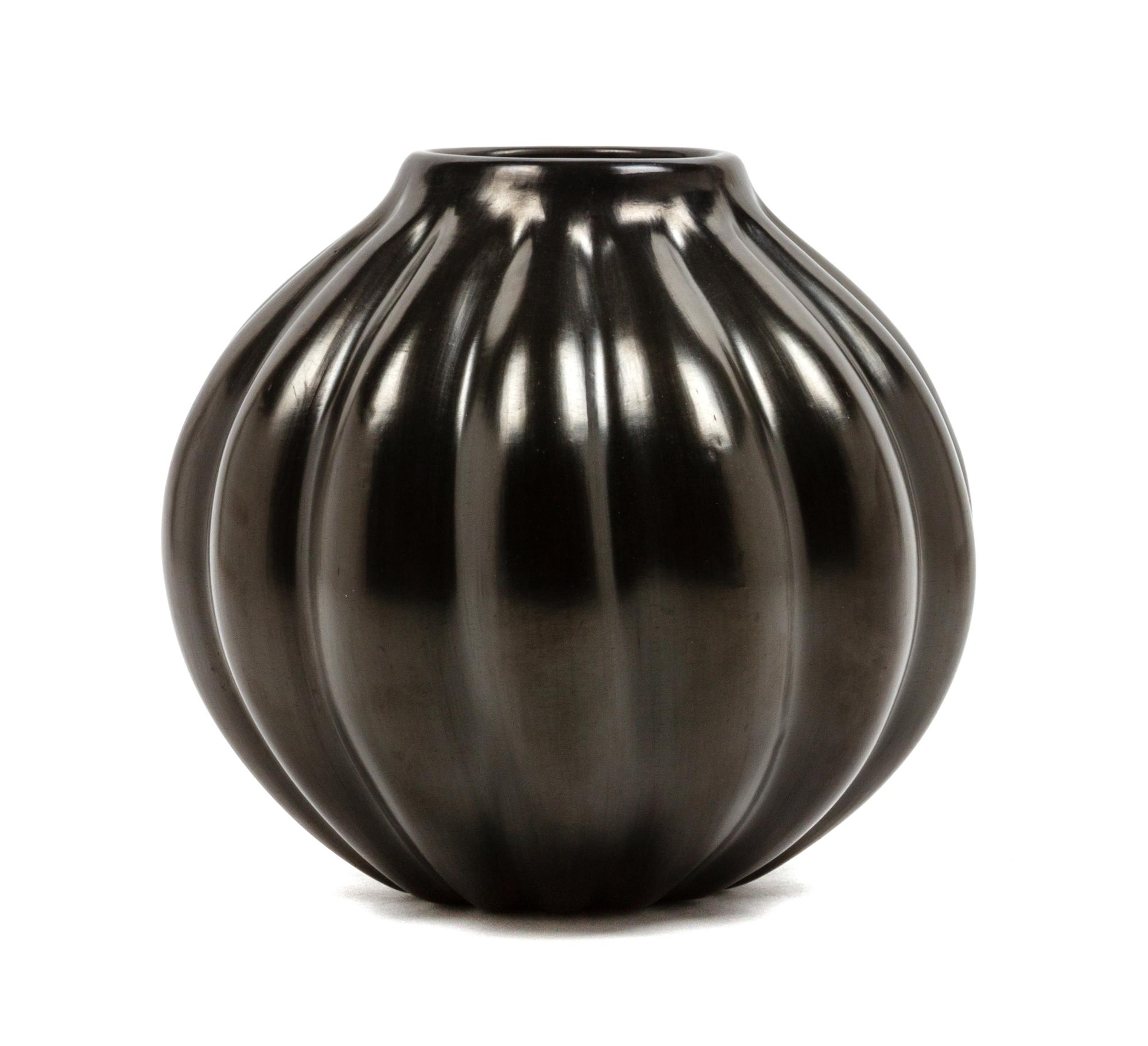 A Santa Clara Blackware Pottery Vase Height 8 x diameter 8 inches. — Helen Shupla