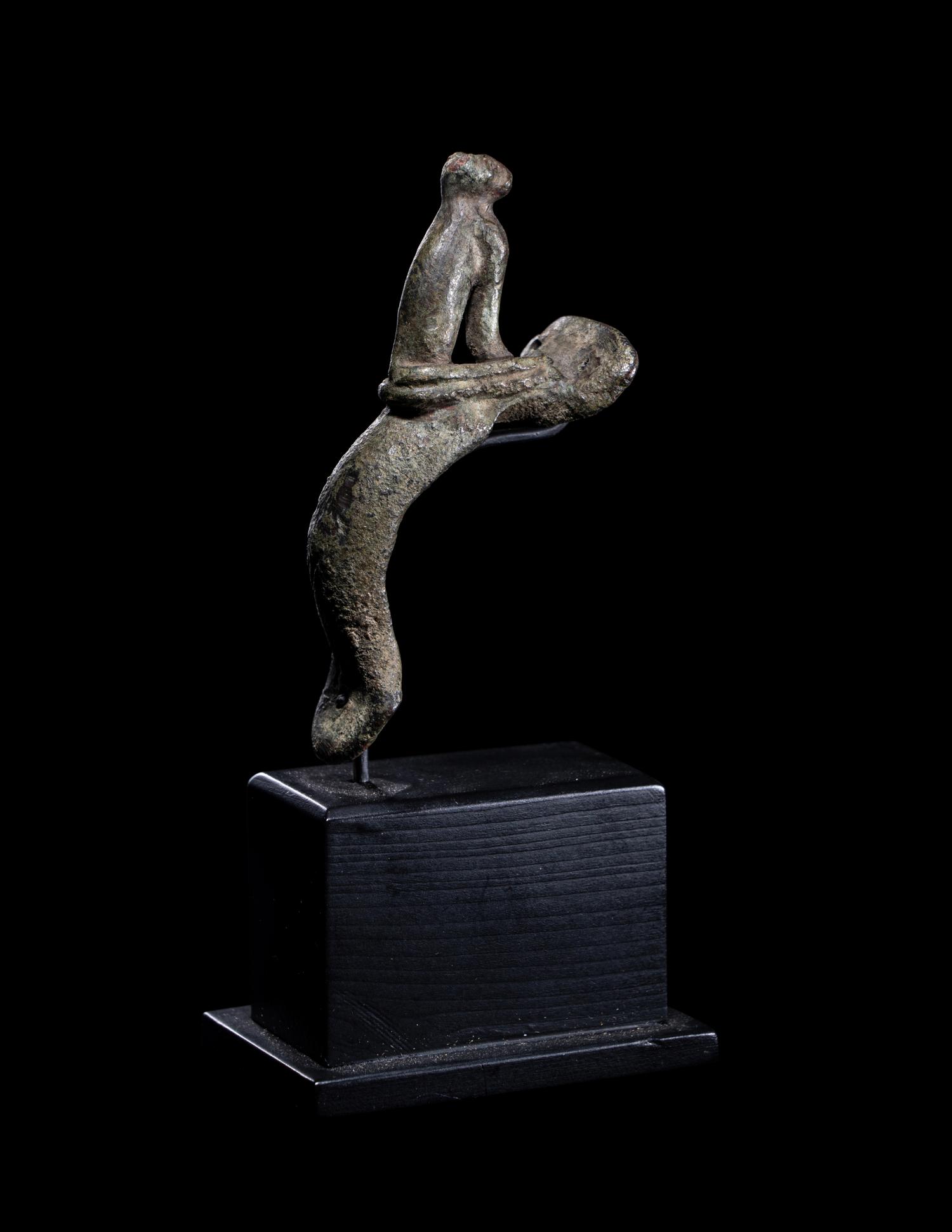 A Roman Bronze Handle with a Seated Cat