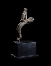 A Roman Bronze Handle with a Seated Cat