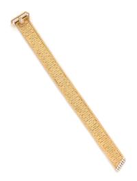 A 14 Karat Bicolor Gold and Diamond Belt Motif Bracelet, Hammerman Brothers, 30.40 dwts.
