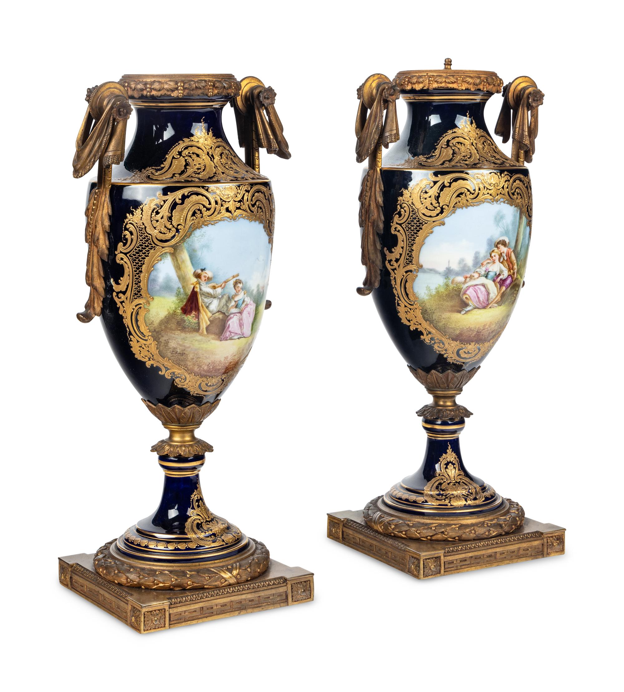 A Pair of Gilt Bronze Mounted Sèvres Style Porcelain Urns