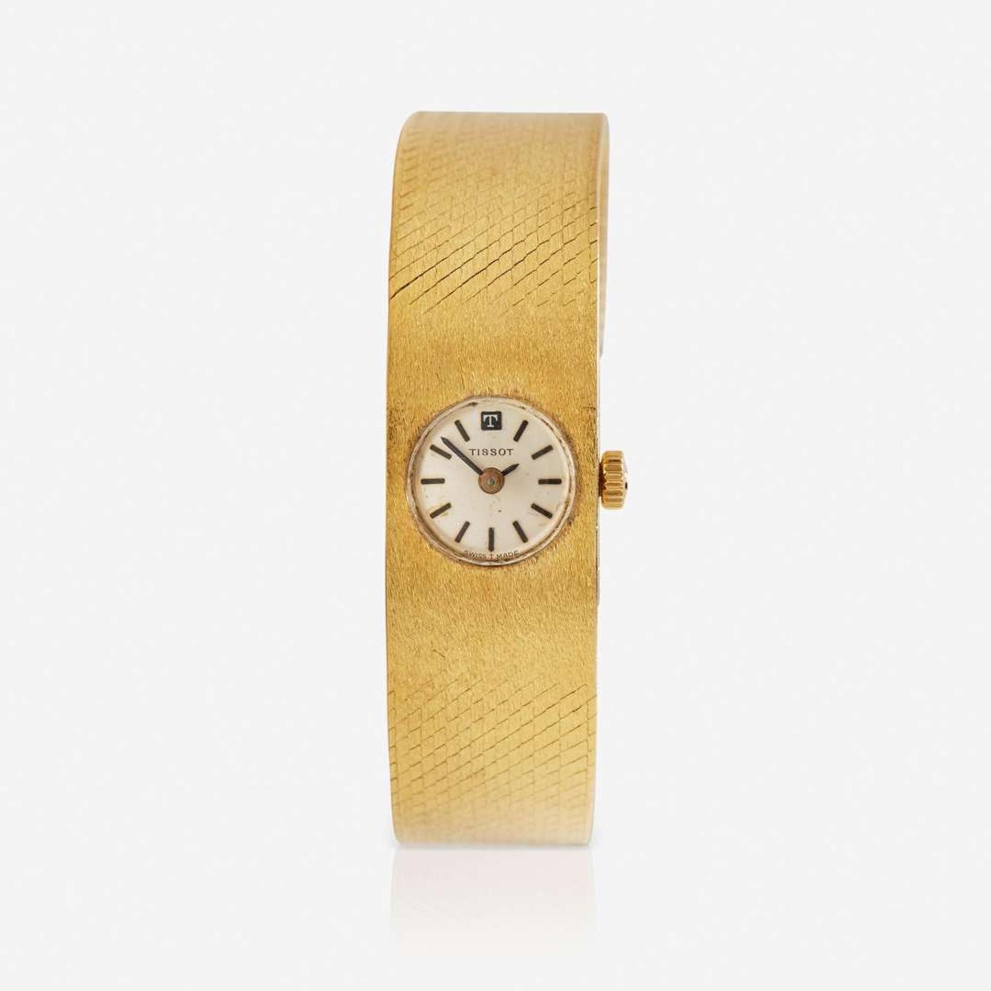 An 18K Yellow Gold Ladies Tissot Watch