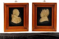 A Pair of Wax Portrait Busts of George and Martha Washington
