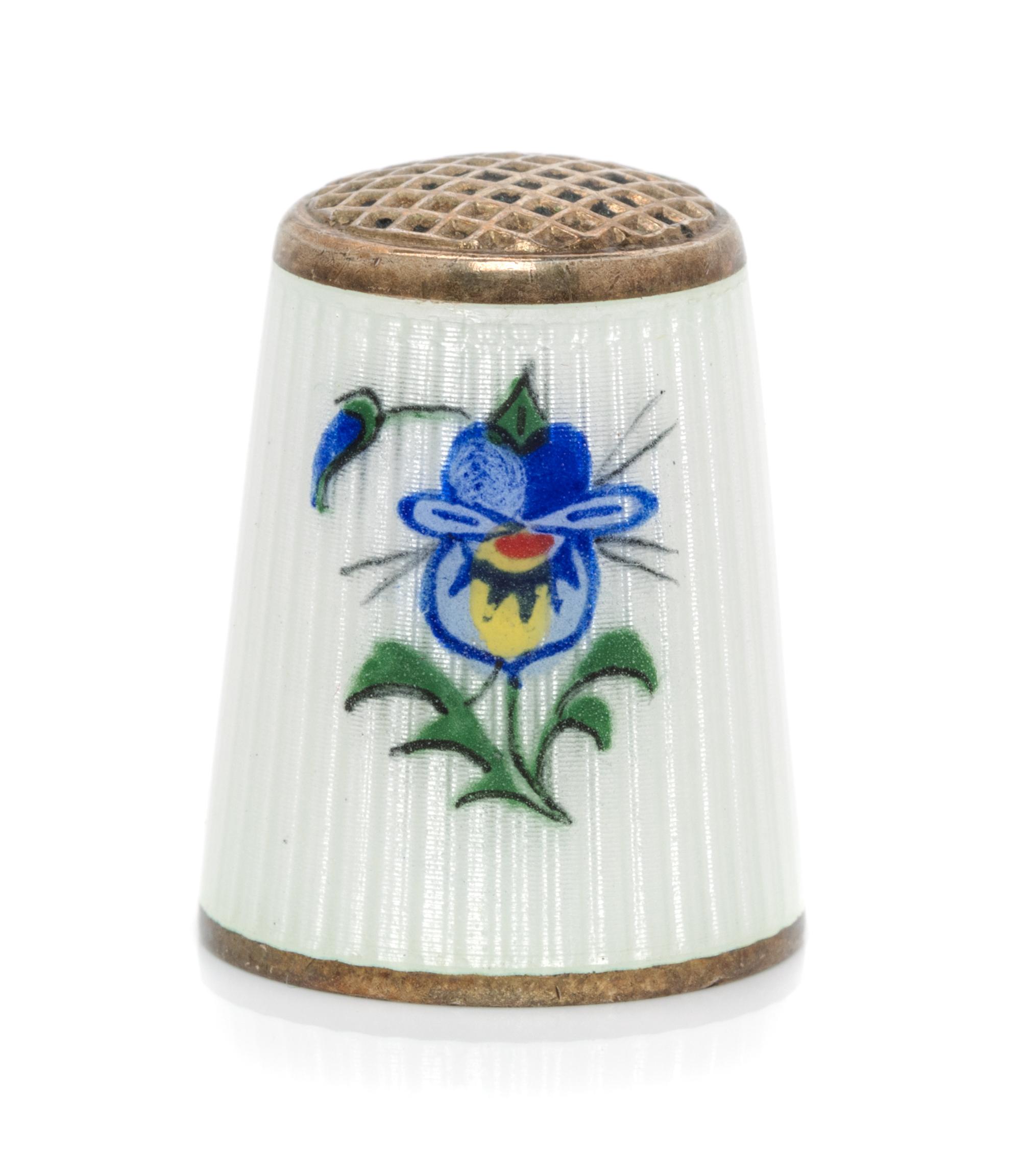 A Norwegian Silver and Guilloche Enamel Thimble, Aksel Holmsen, Sandefjord, 20th Century, the knurled top above a white guilloche ename