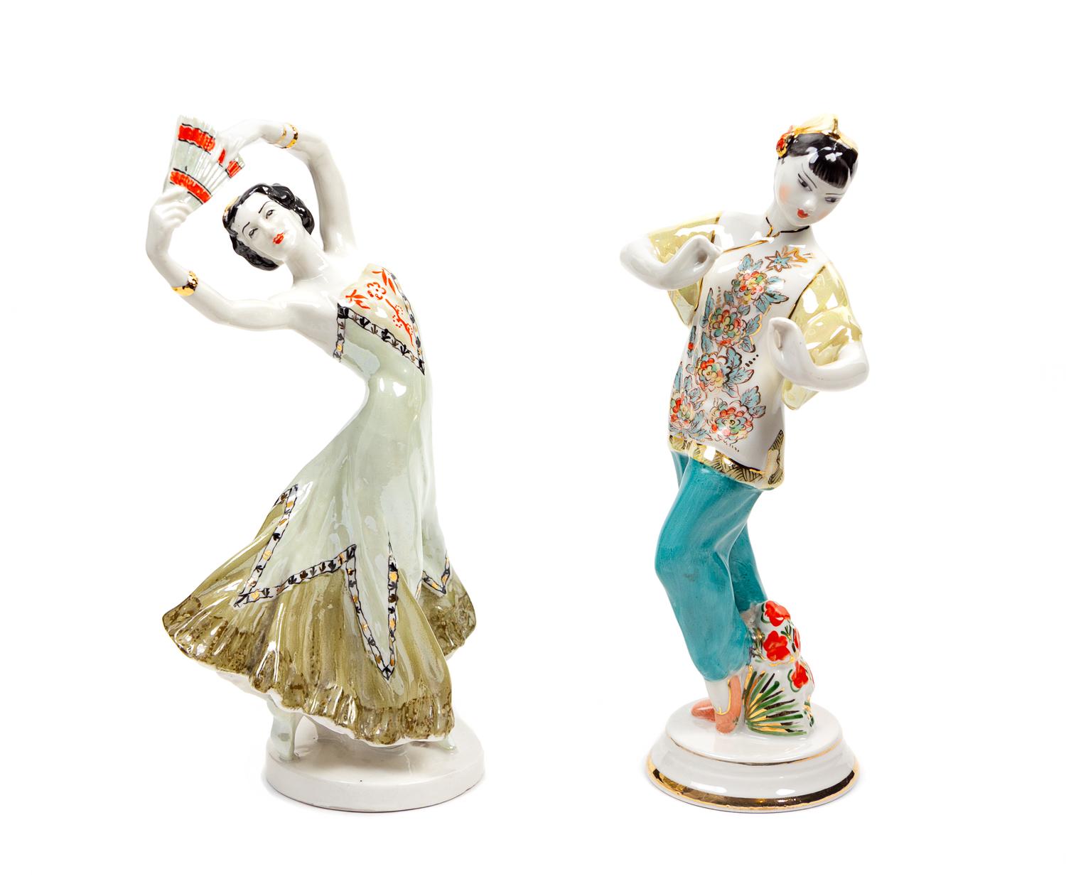Two Russian Porcelain Figures 20TH CENTURY each with…