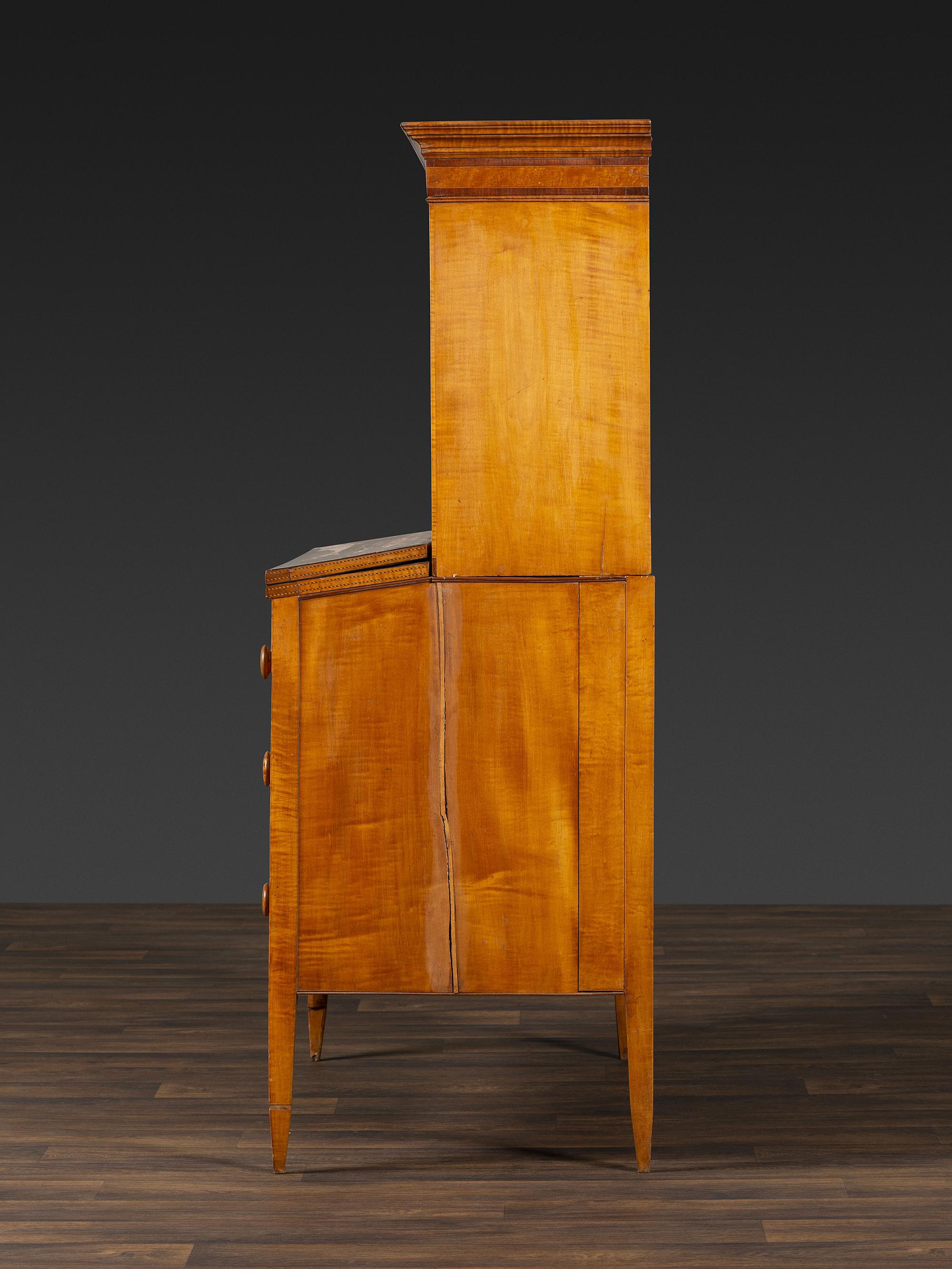 A Federal Inlaid Bird's Eye Maple and Mahogany Tambour Writing Desk