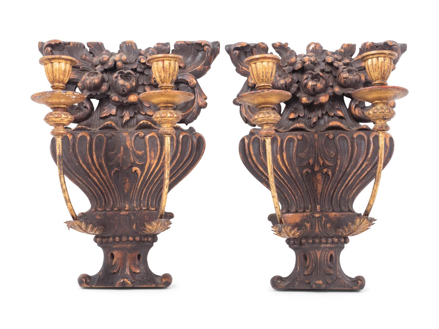 A Pair of French Carved Walnut and Giltwood Two-Light Sconces