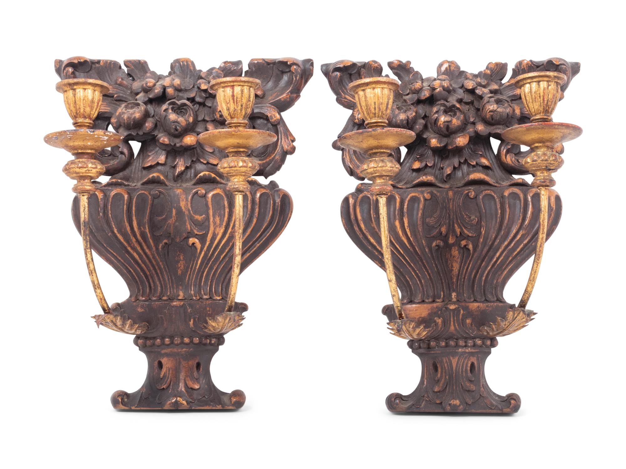 A Pair of French Carved Walnut and Giltwood Two-Light Sconces