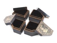 A Set of Regency Parcel-Gilt and Black Lacquered Jewelry Boxes