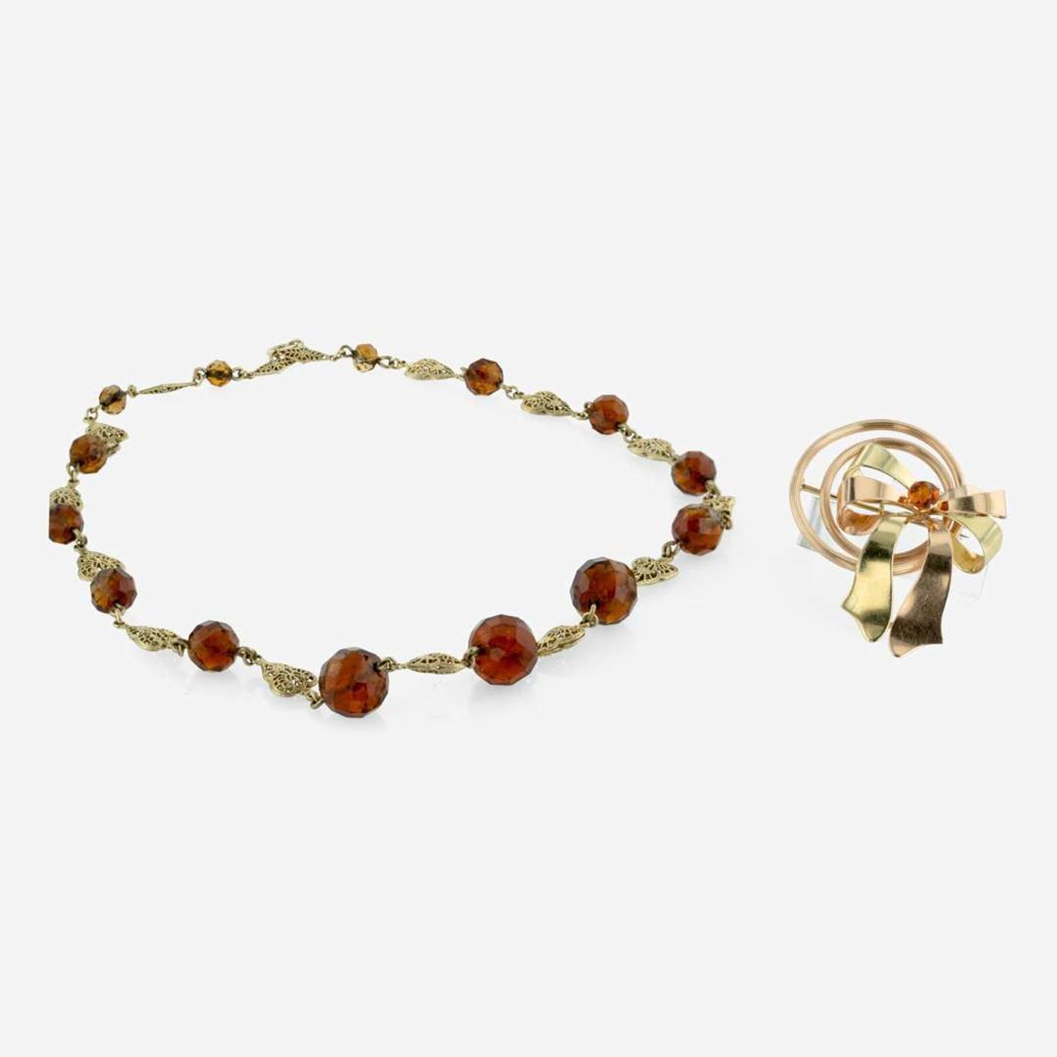 A Garnet Pendant and Citrine Necklace