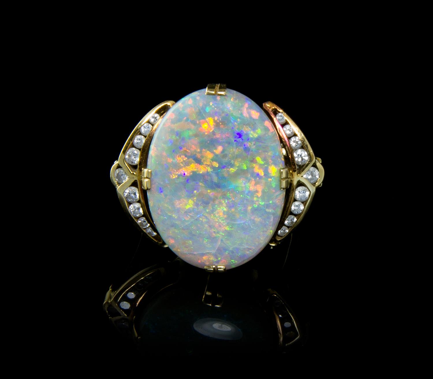 A Yellow Gold, Opal and Diamond Ring, 4.80 dwts.