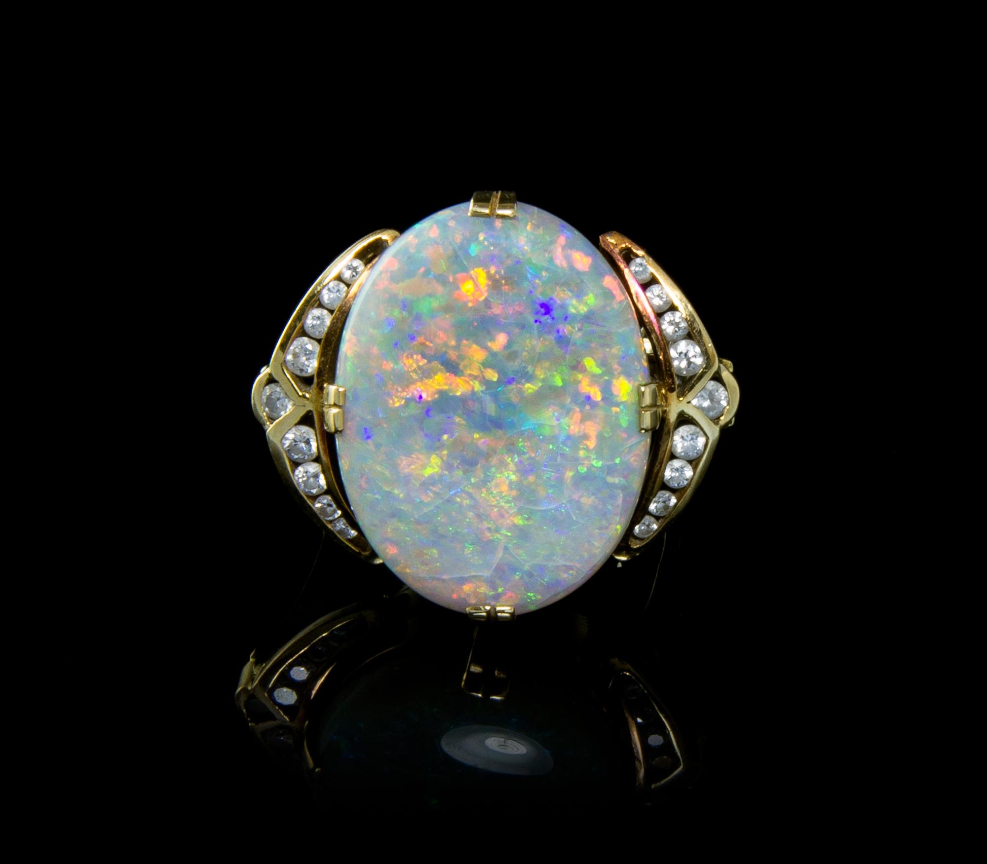 A Yellow Gold, Opal and Diamond Ring, 4.80 dwts.