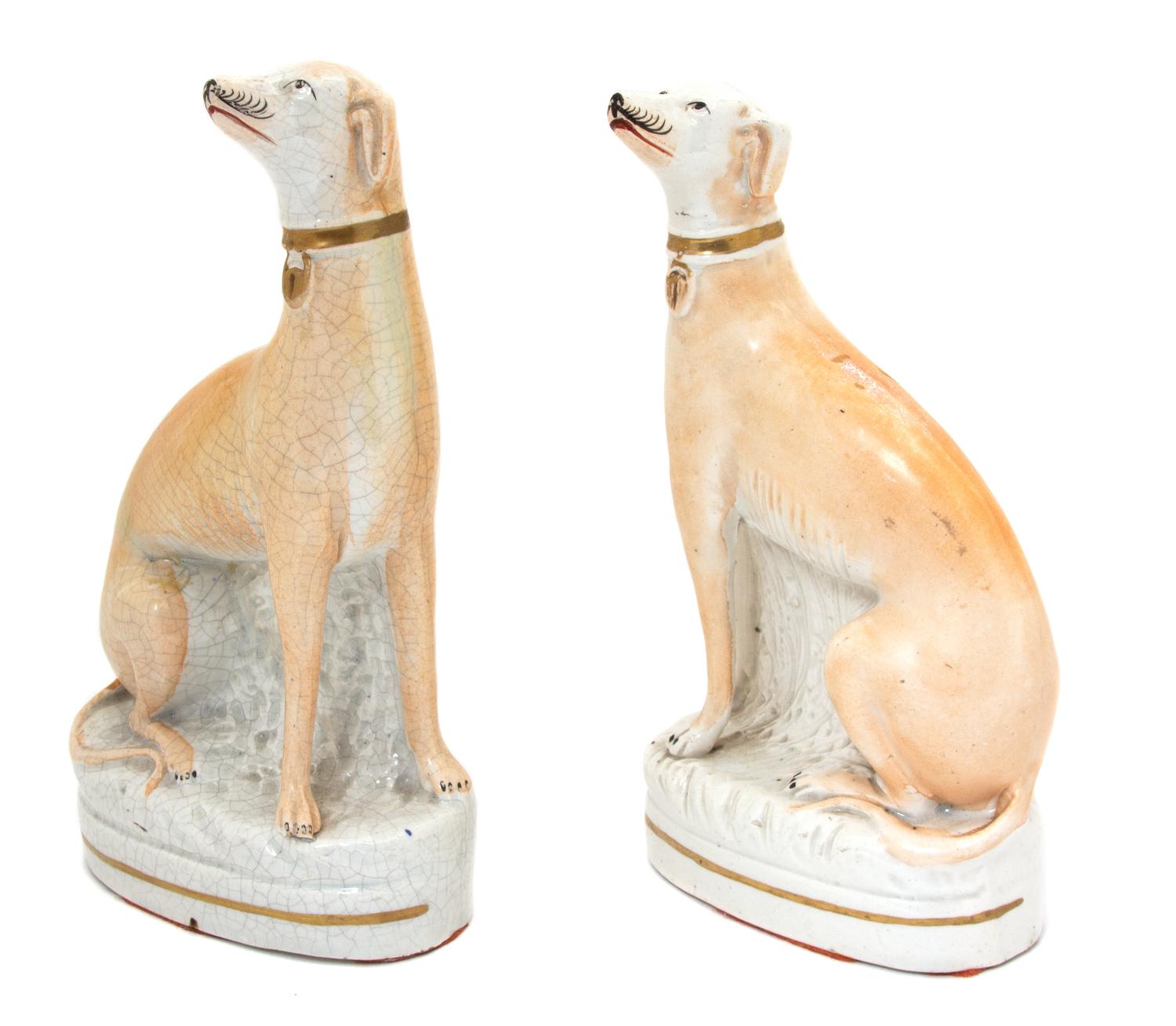 A Pair of Staffordshire Porcelain Models of Greyhounds Height 8 x width 4 1/2 inches. — CIRCA 1810