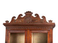 A Walnut and Curly Maple Desk and Bookcase by Jacob Werrey (1838-1893)