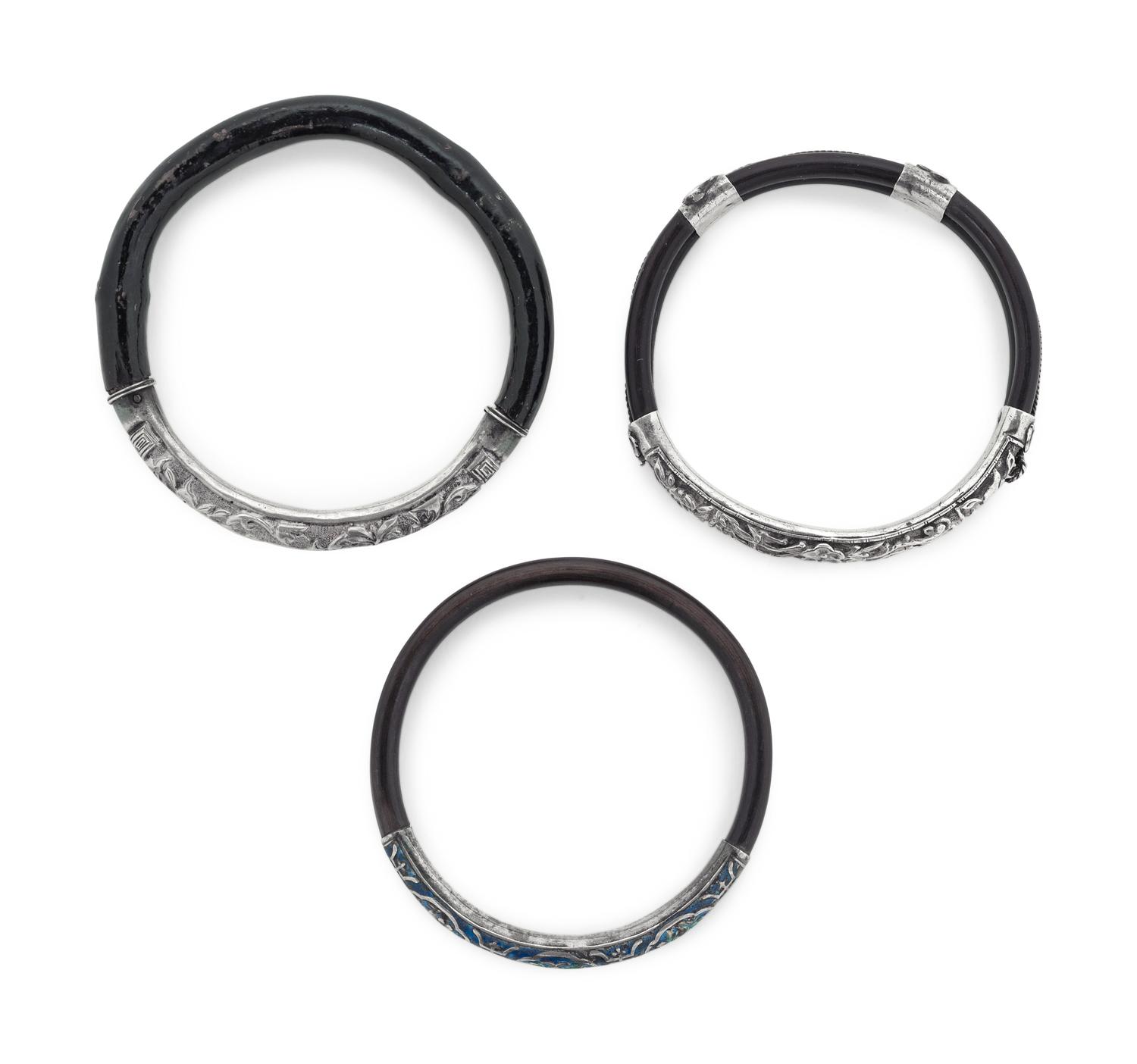 Three Chinese Silver Mounted Cane Bangles