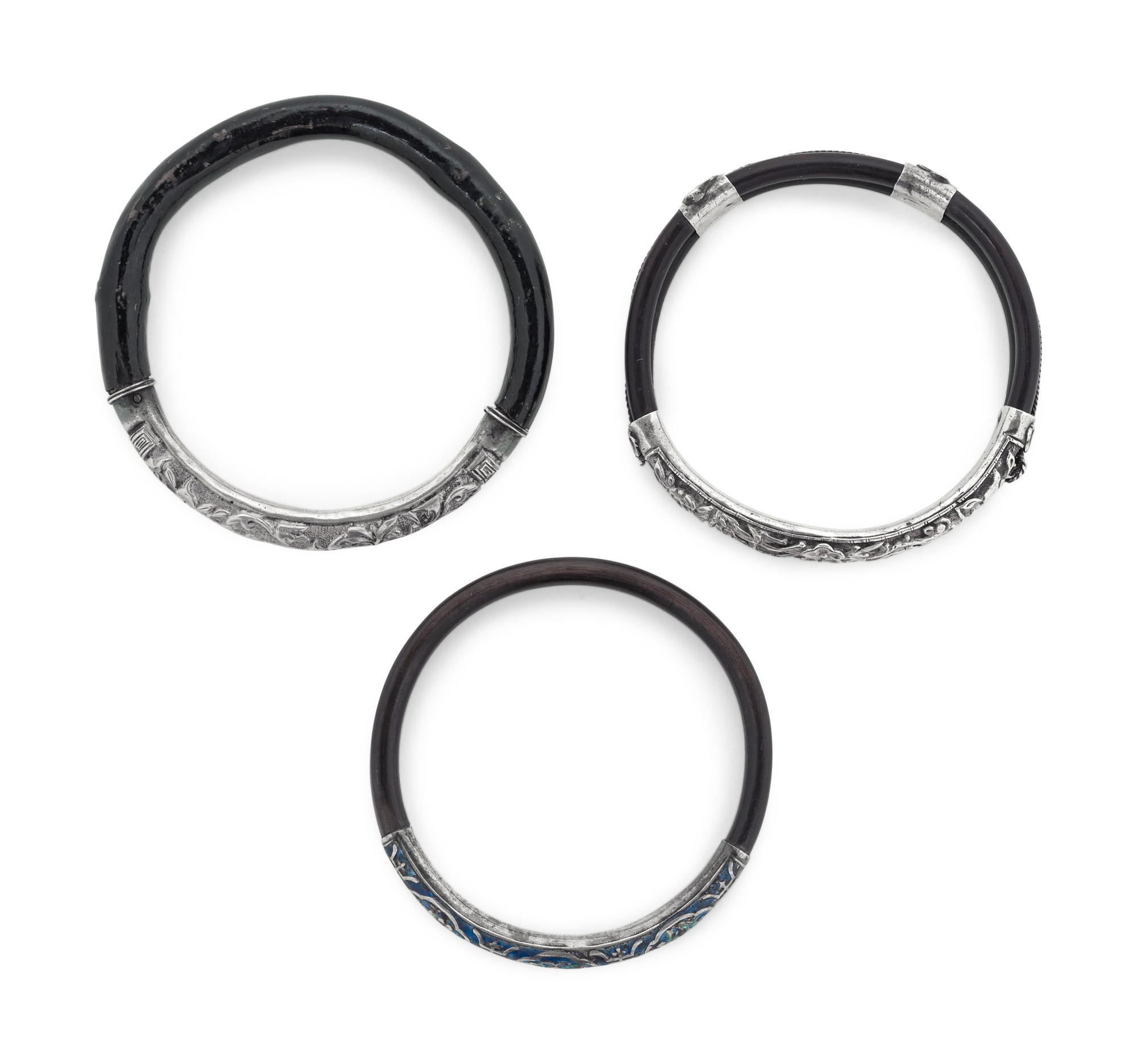 Three Chinese Silver Mounted Cane Bangles
