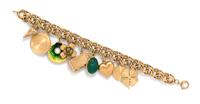A 14 Karat Yellow Gold Charm Bracelet with Nine Attached Charms, 33.20 dwts.