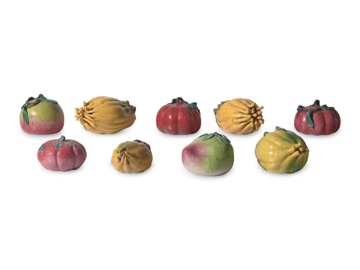 A Collection of Nine Chinese Export Porcelain Altar Fruits, 19th Century