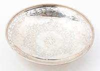 An American Silver Cake Dish, Brock & Co., New York, NY, having a pierced border and the initials HEB centered within a band of flowers