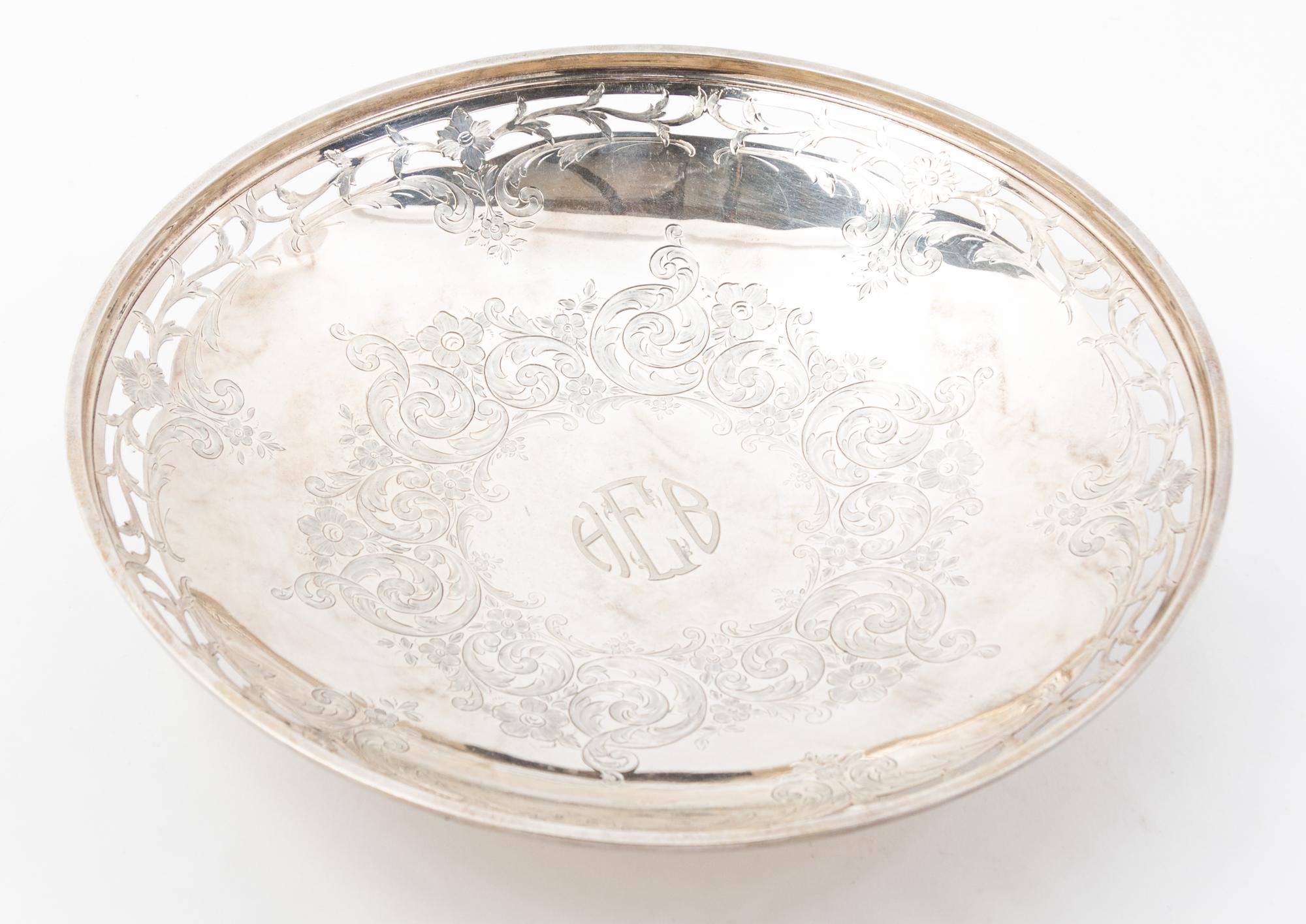 An American Silver Cake Dish, Brock & Co., New York, NY, having a pierced border and the initials HEB centered within a band of flowers