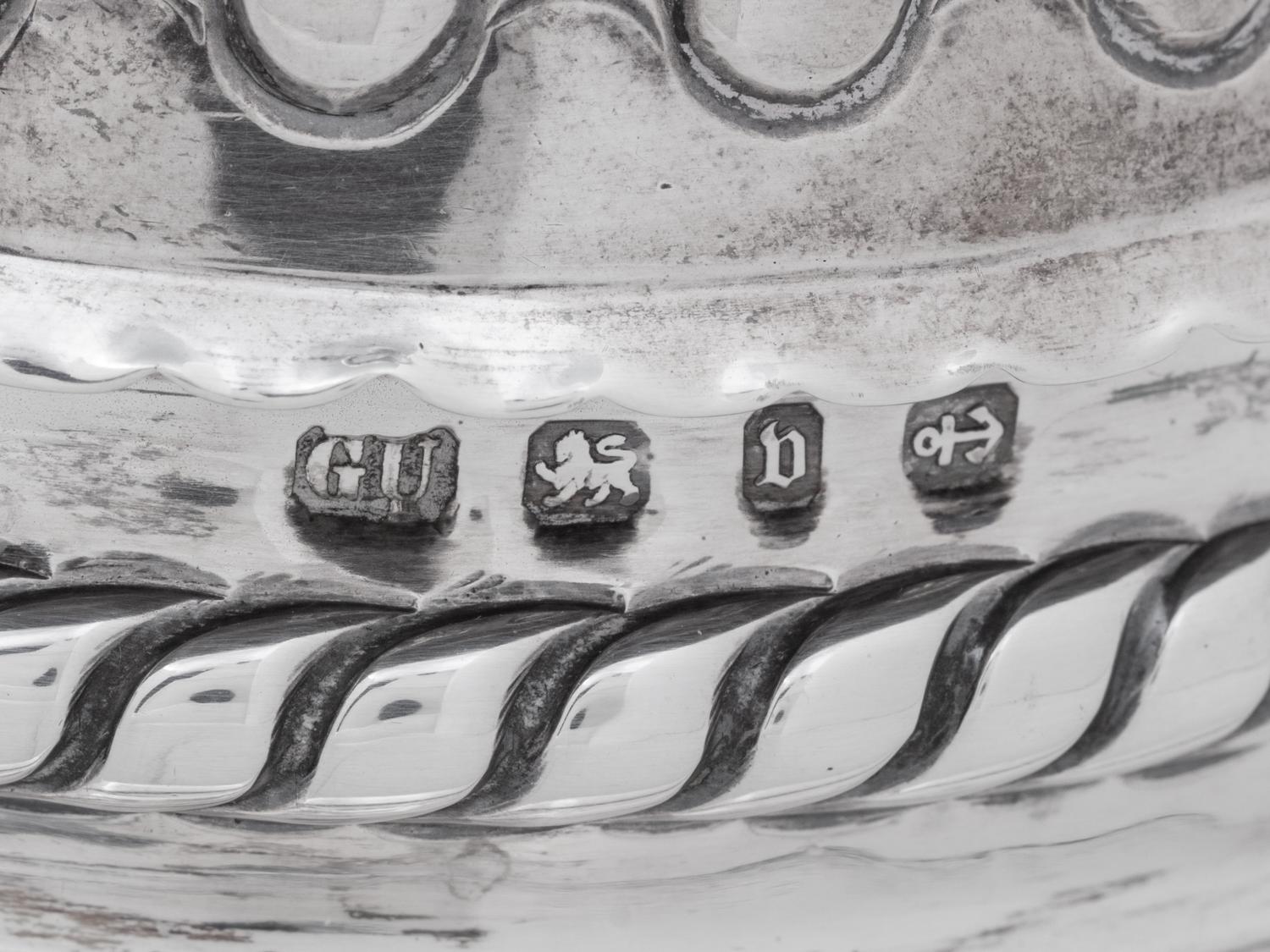 An English Silver Dinner Bell and Toast Rack