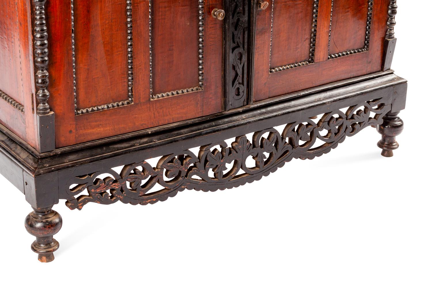 A Dutch Colonial Parcel Ebonized Mahogany Cabinet
