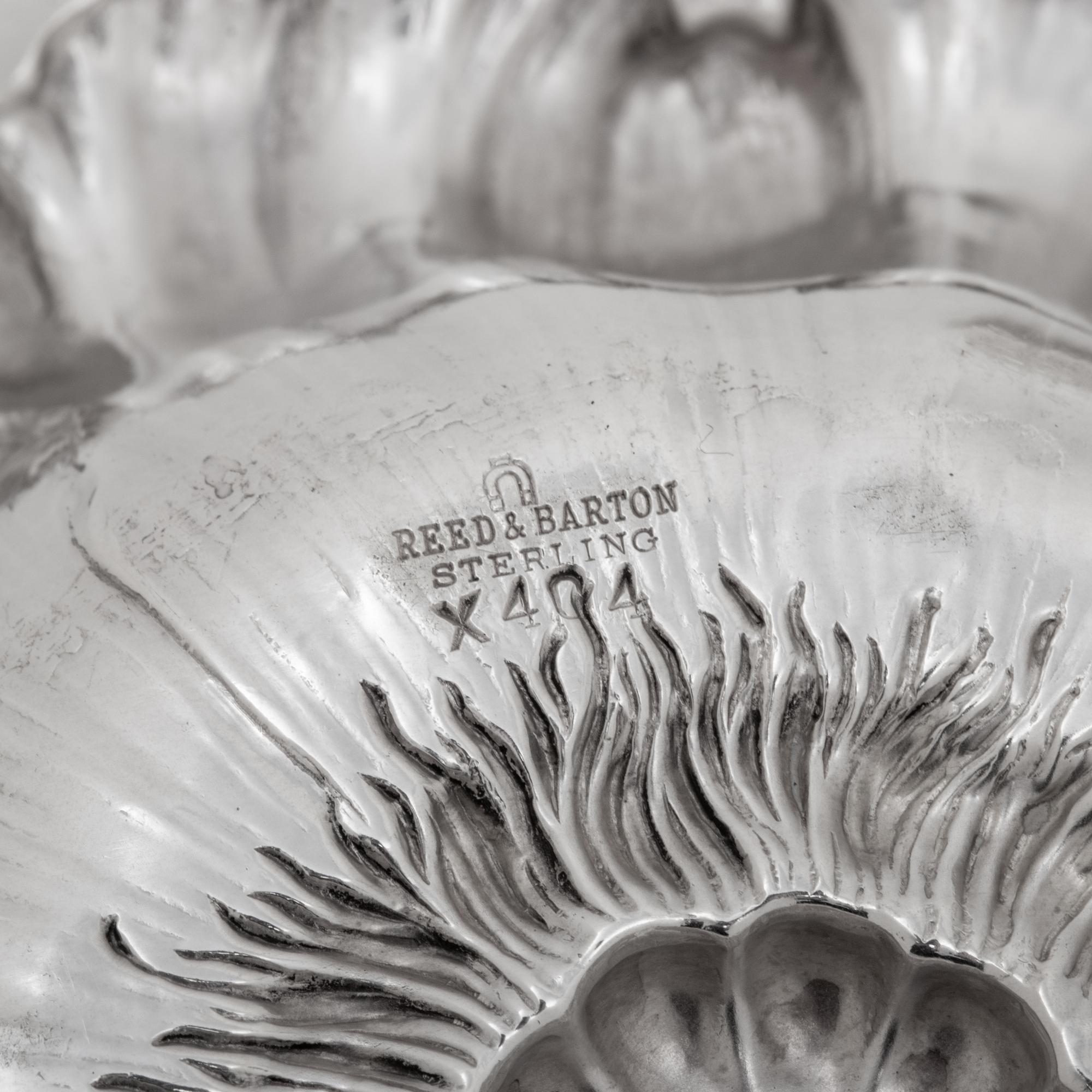 A Group of Four American Silver Repoussé-Decorated Trinket Dishes