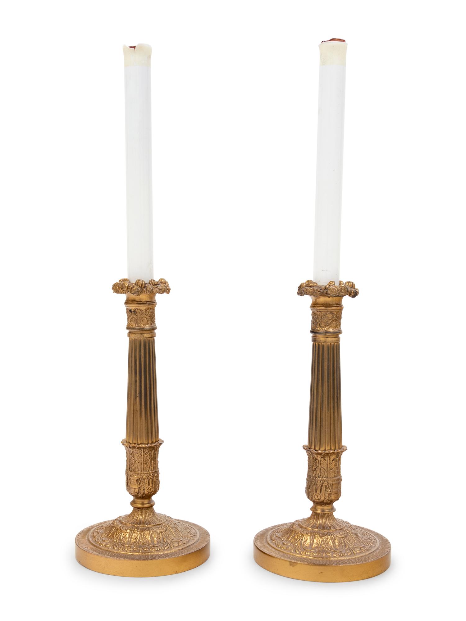 A Pair of French Gilt Metal Candlesticks Mounted as Lamps