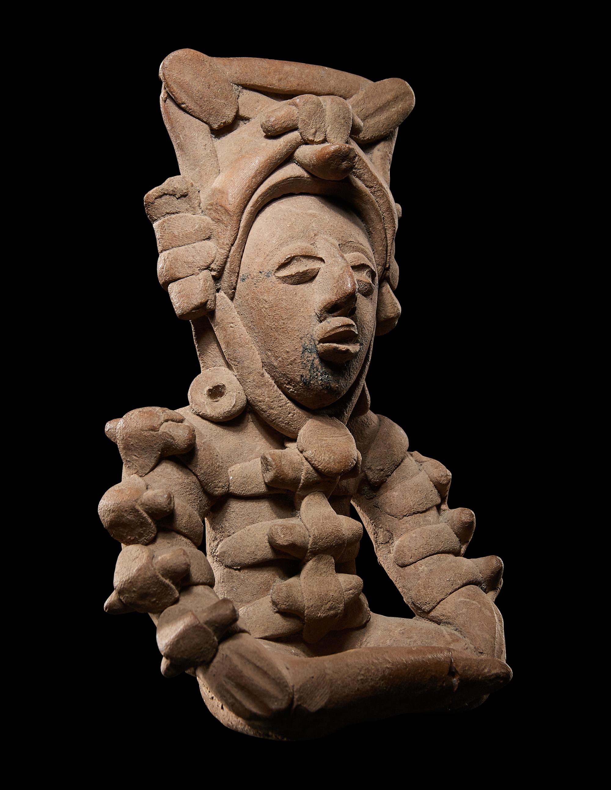 A Veracruz Seated Deity Figure