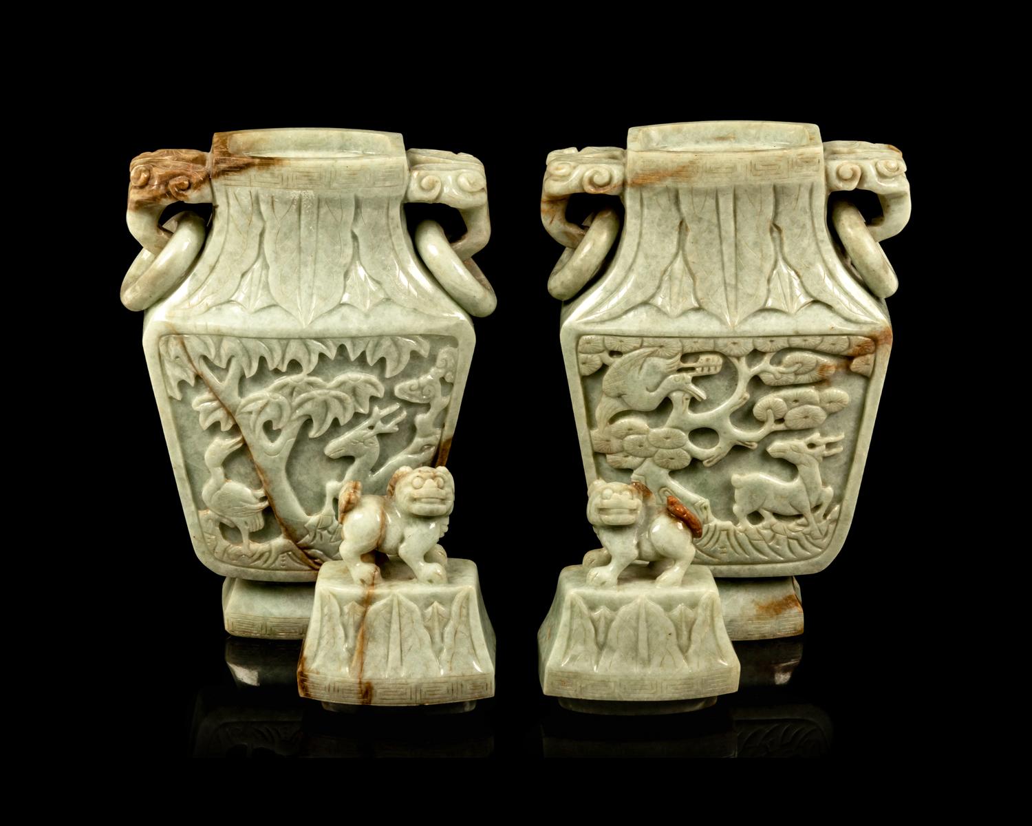 A Pair of Chinese Carved Celadon Jadeite Covered Vases