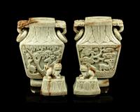A Pair of Chinese Carved Celadon Jadeite Covered Vases