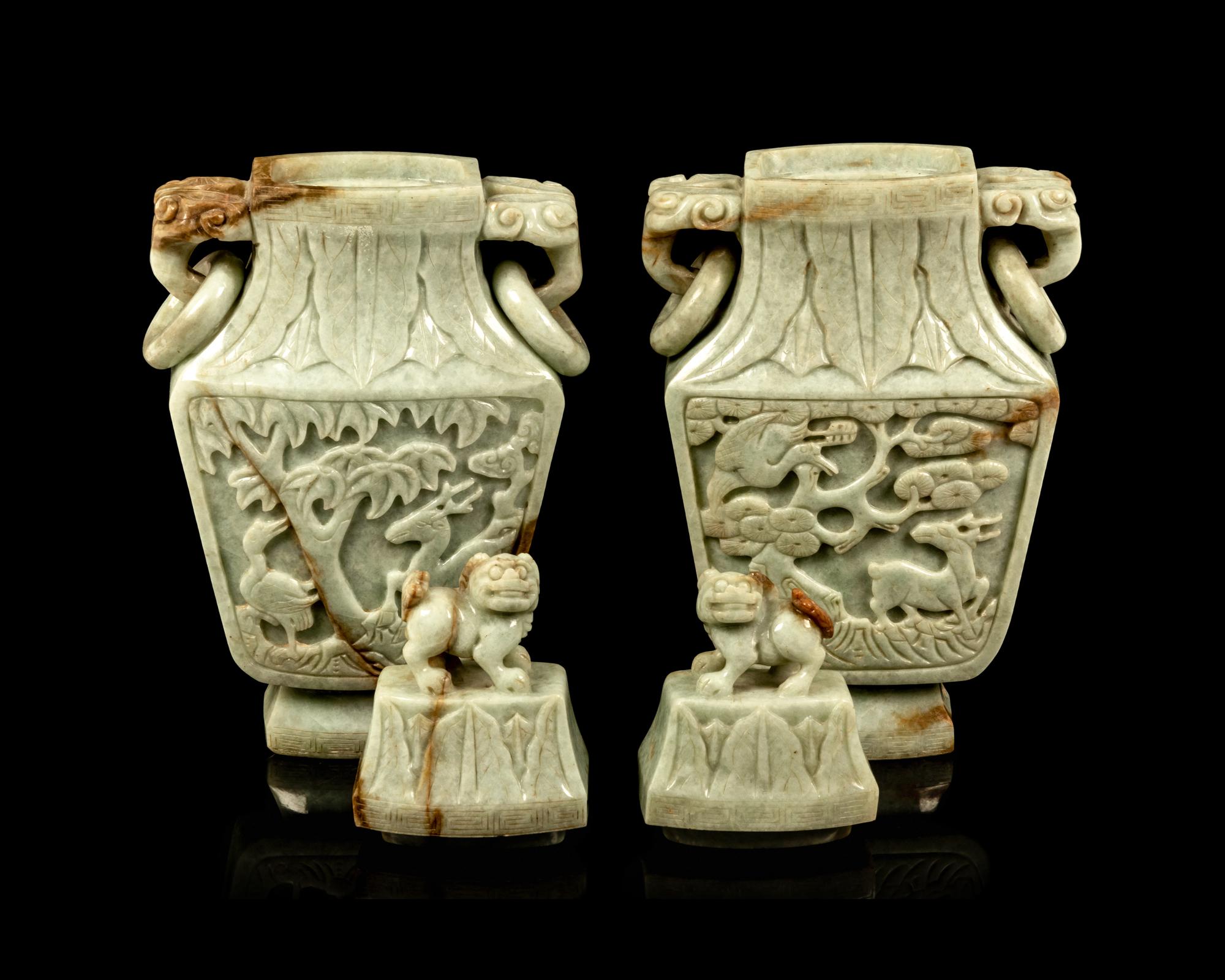 A Pair of Chinese Carved Celadon Jadeite Covered Vases