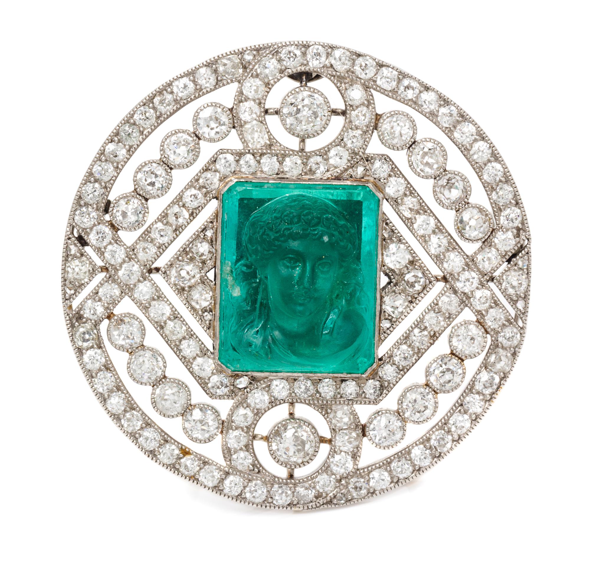 A Platinum, Diamond and Emerald Cameo Brooch, 11.70 dwts.