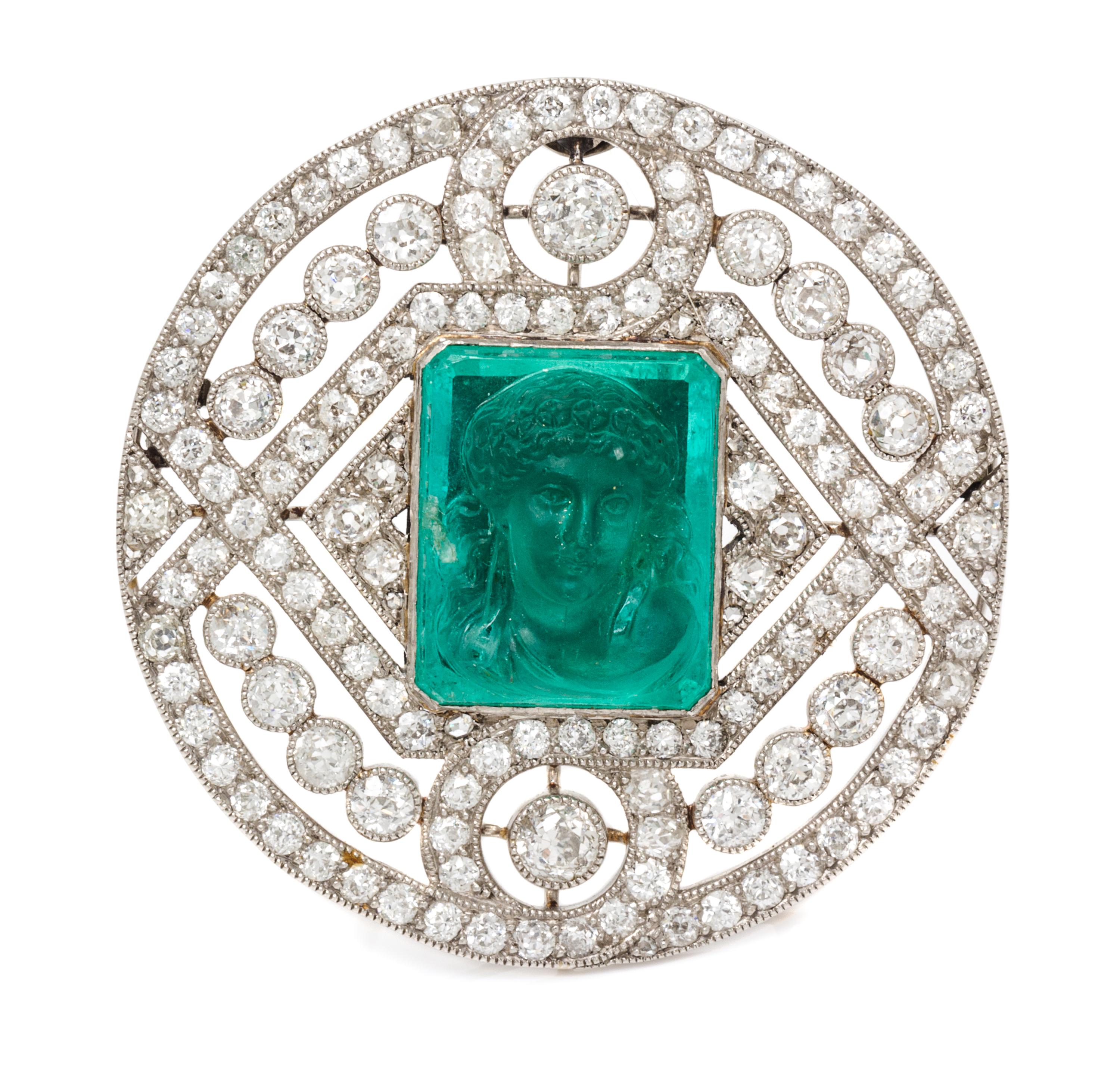 A Platinum, Diamond and Emerald Cameo Brooch, 11.70 dwts.