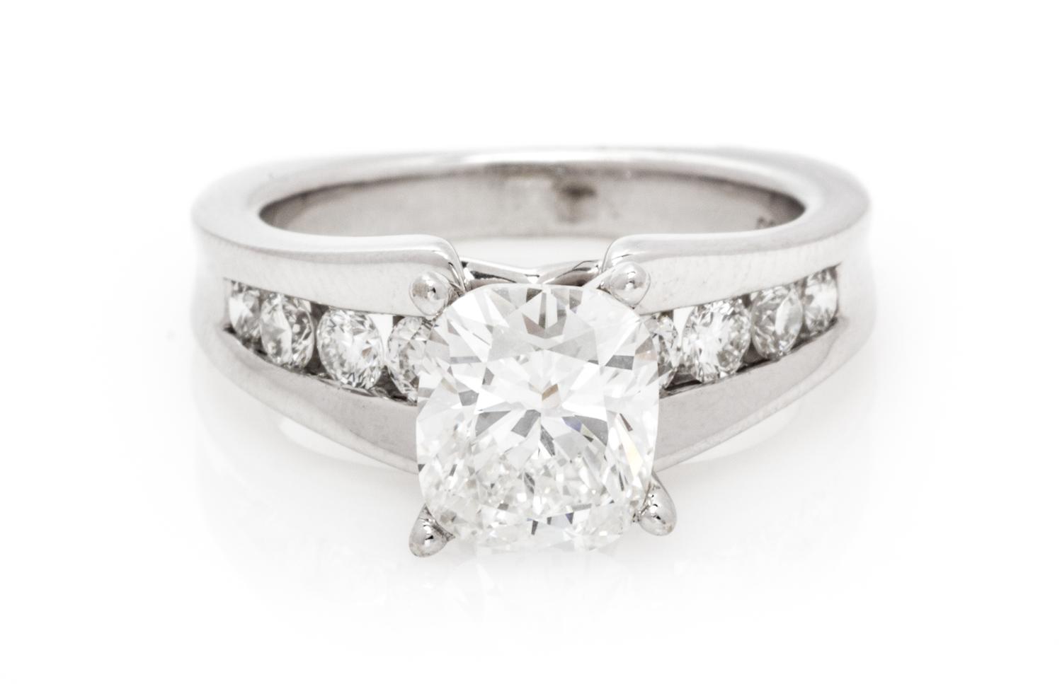 A Platinum, White Gold and Diamond Ring, 6.20 dwts.