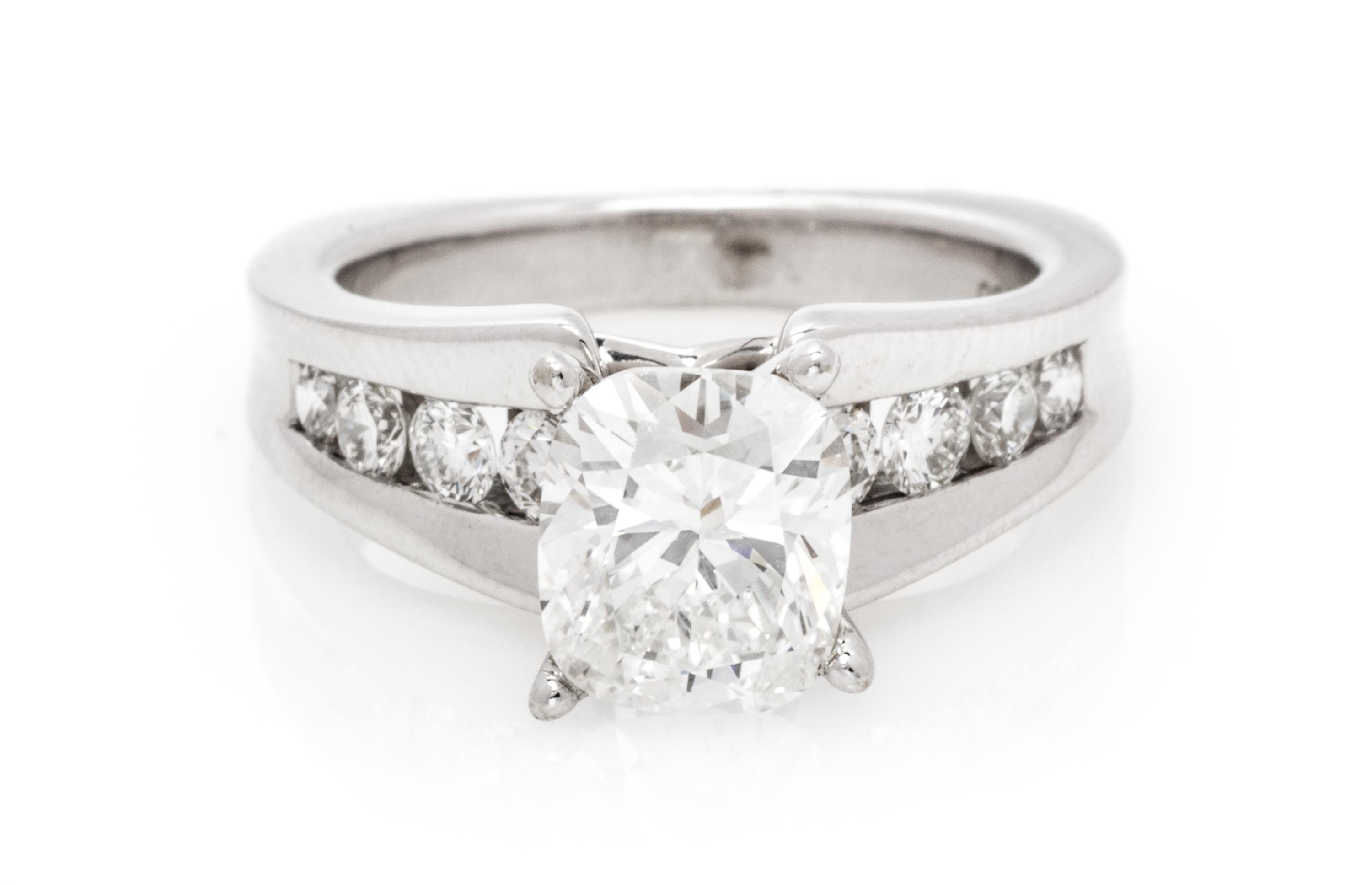 A Platinum, White Gold and Diamond Ring, 6.20 dwts.
