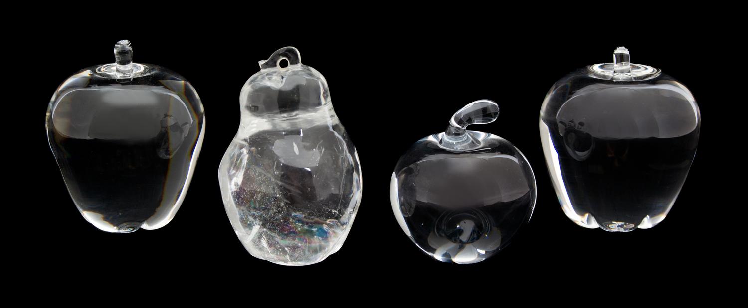 Three Crystal Apples and a Rock Quartz Pear Height of tallest 4 1/4 inches. — 20TH CENTURY