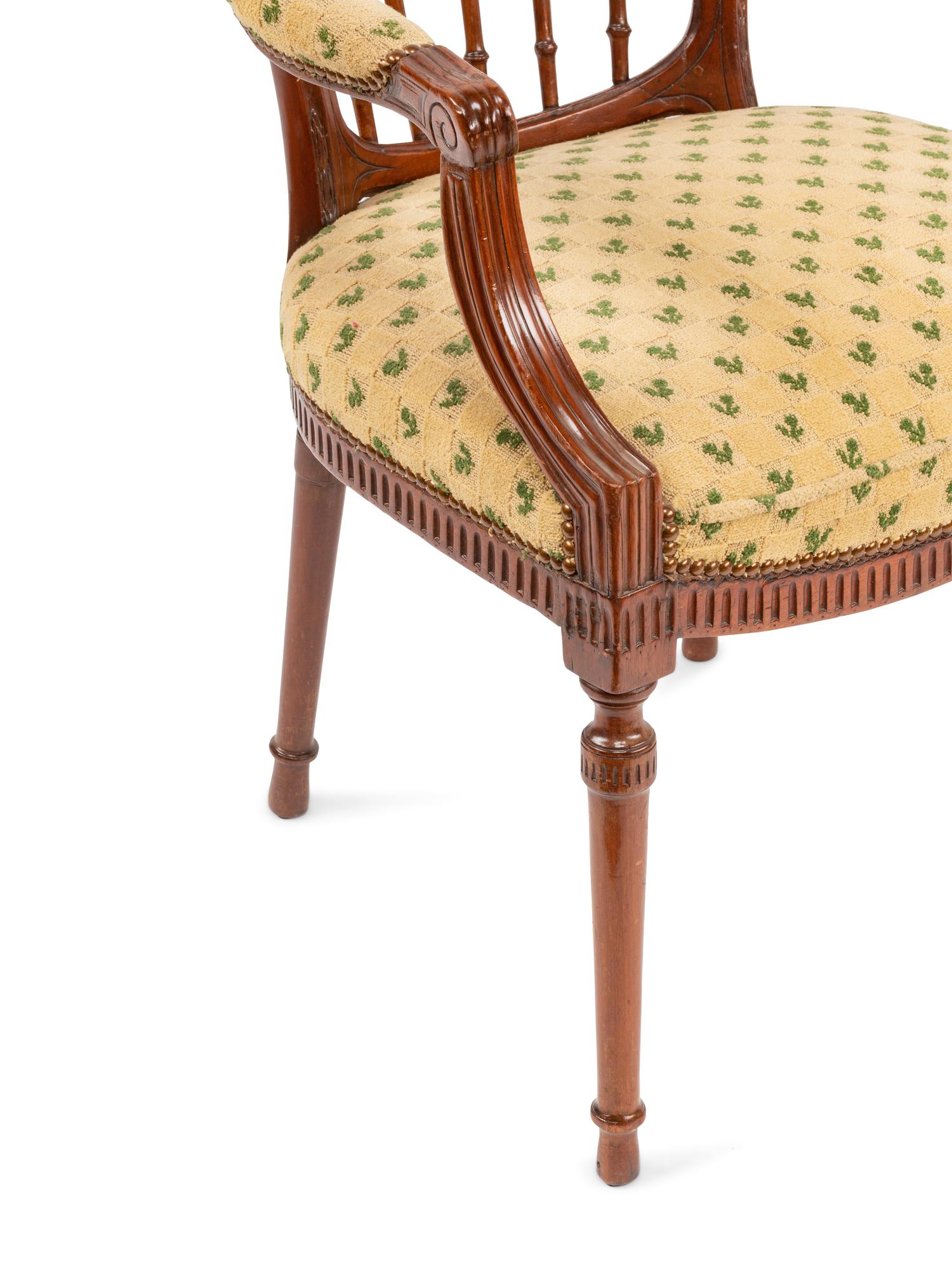 An Italian Neoclassical Walnut Armchair with Needlepoint Upholstery