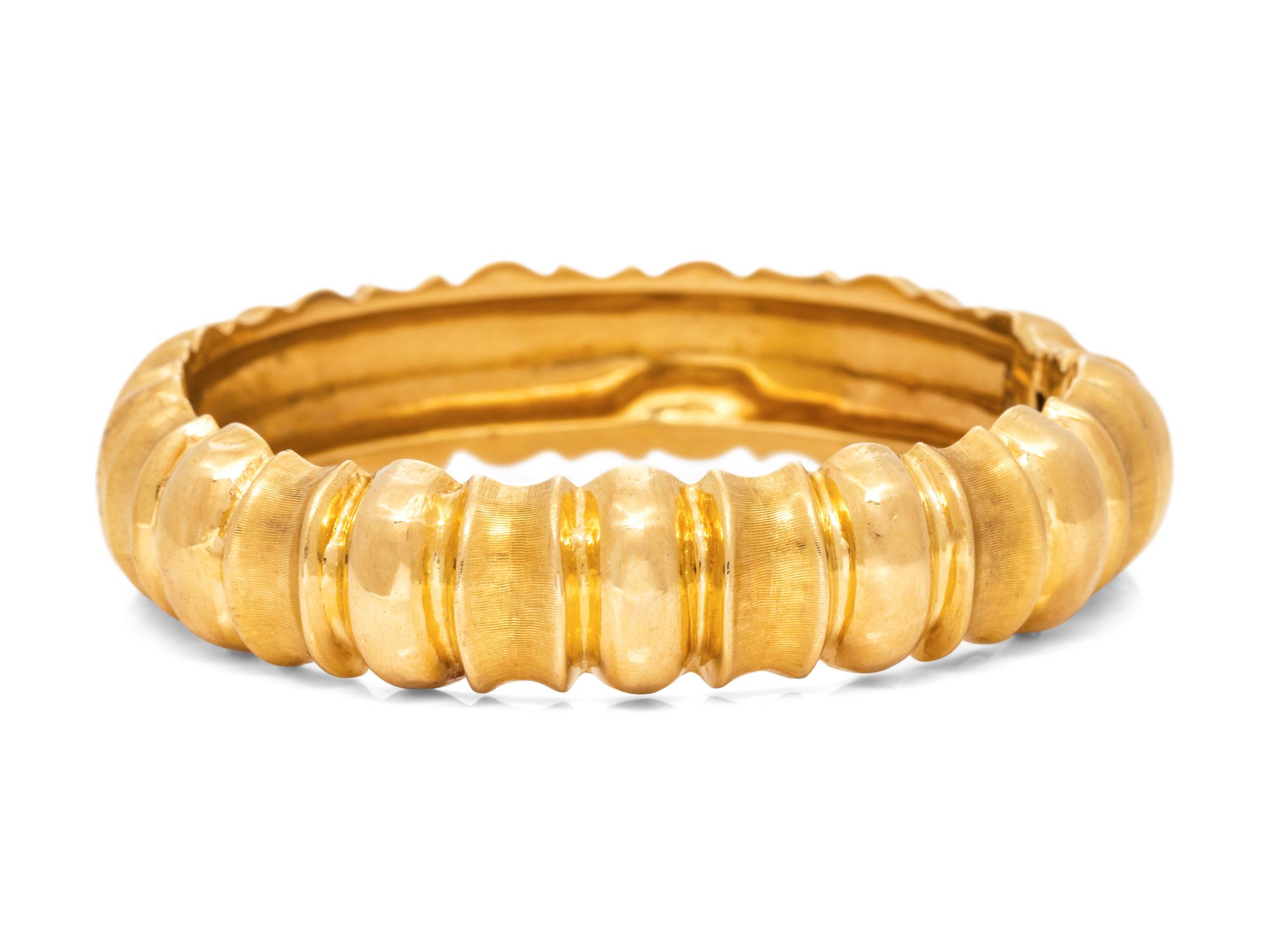 An 18 Karat Yellow Gold Bangle,