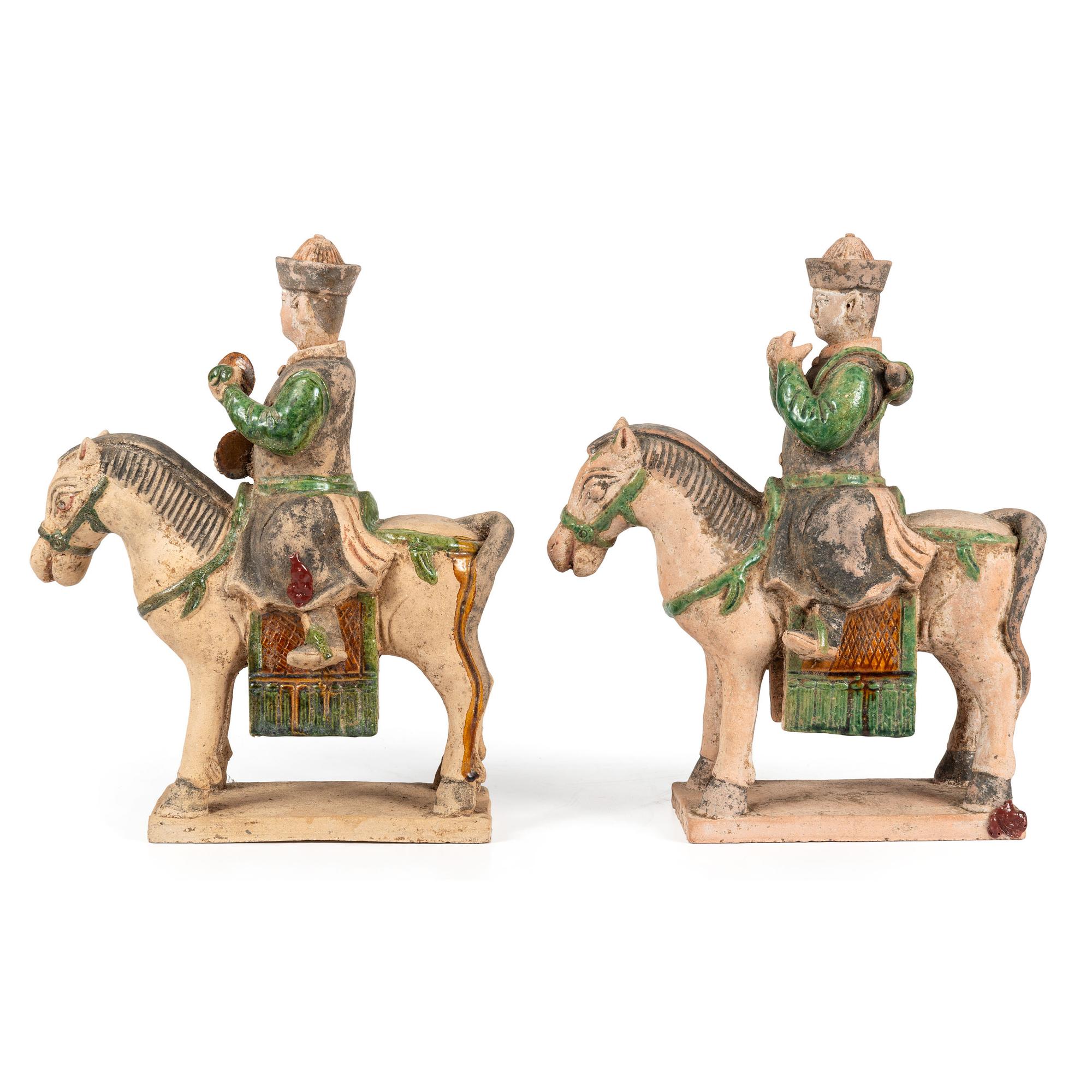 A Pair of Terracotta Equestrian Musician Figures