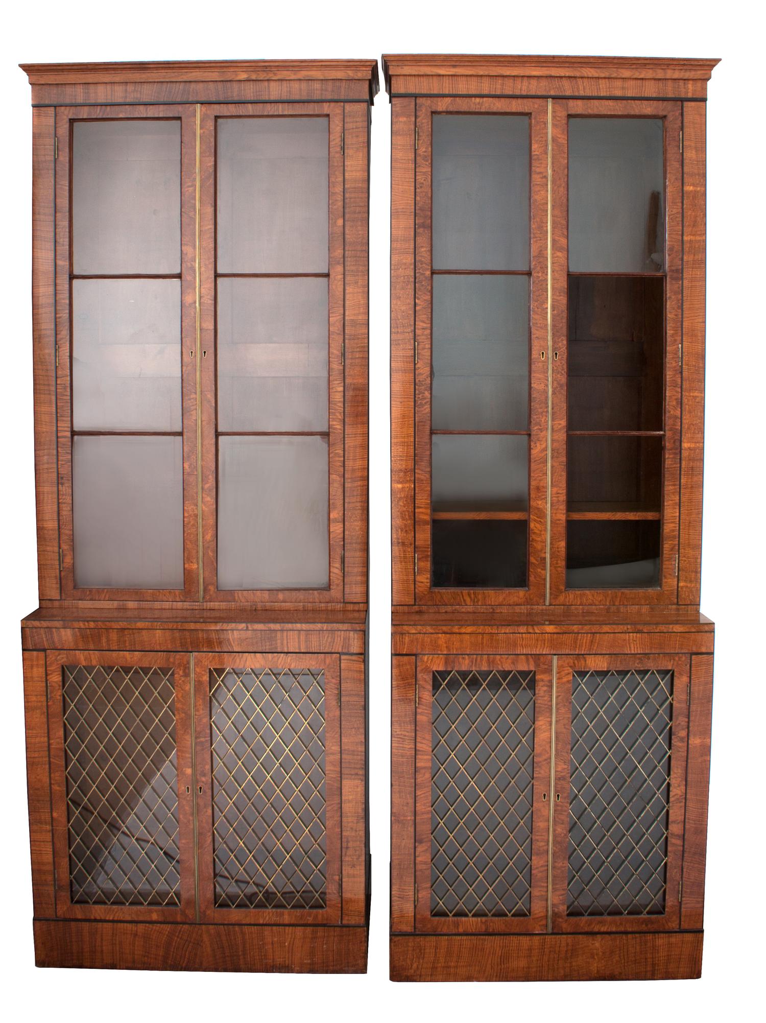 A Pair of George III Style Walnut Bookcase Cabinets Height 93 x width 31 3/4 x depth 17 1/2 inches. — 19TH CENTURY