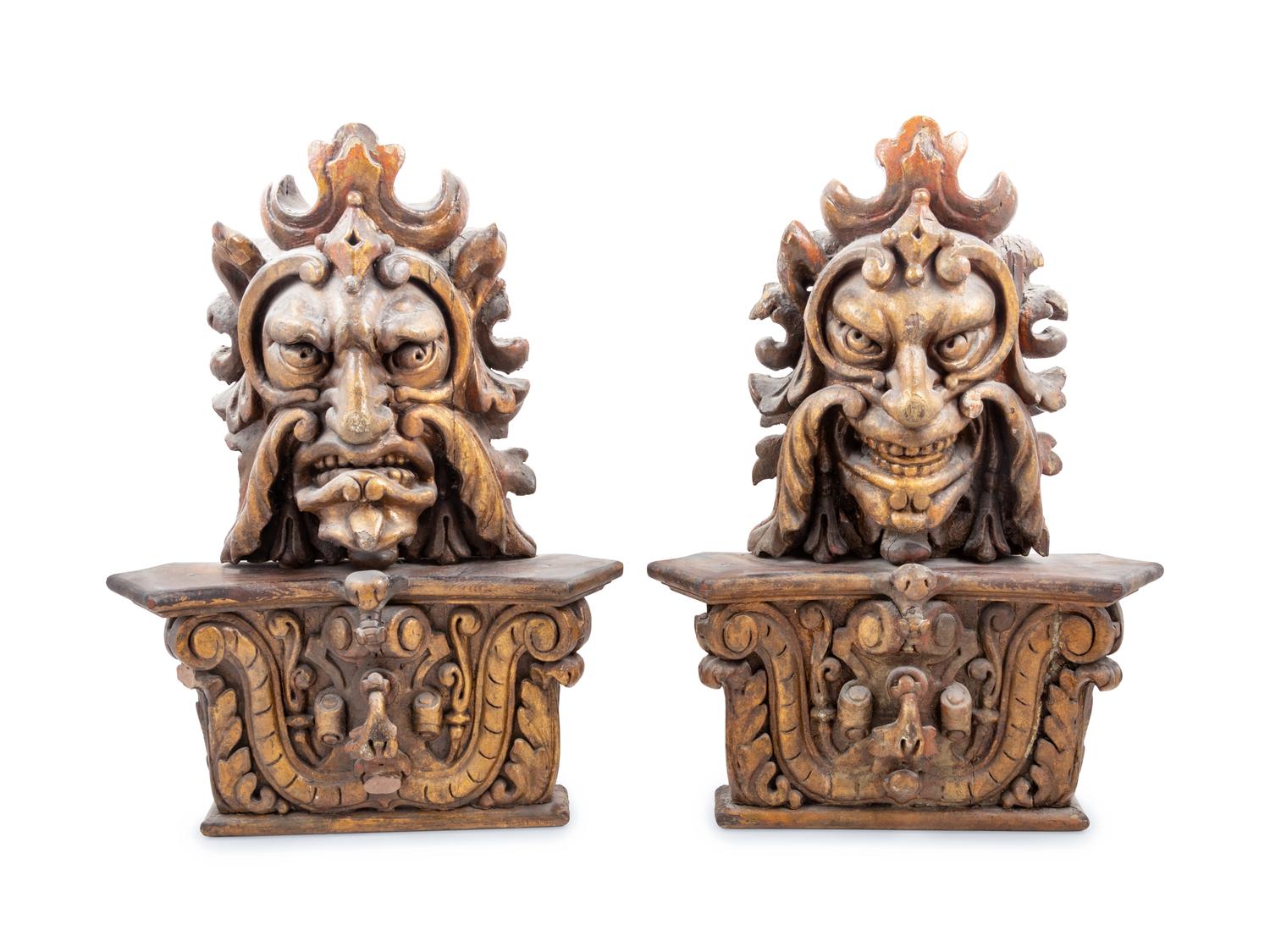 A Pair of Italian Painted and Parcel Gilt Masks