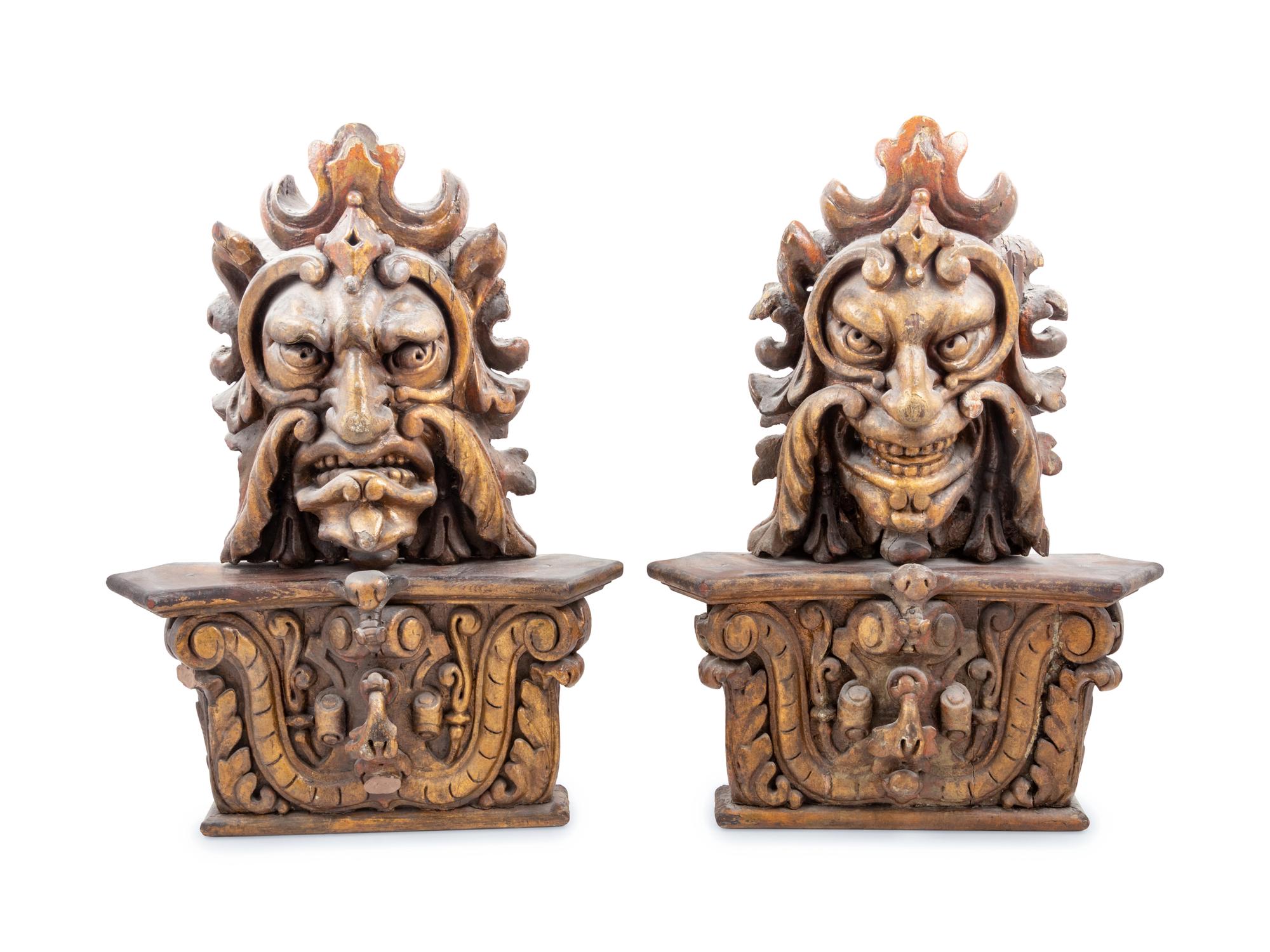 A Pair of Italian Painted and Parcel Gilt Masks