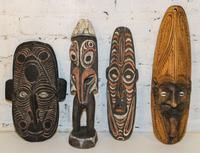 A Group of Sepik River Valley Articles, New Guinea Height of figure 15 1/2 inches.