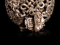 A Chinese Reticulated Silver Snuff Bottle