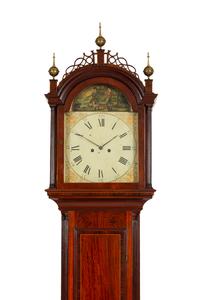 A Federal Carved, Inlaid and Figured Mahogany Tall Case Clock