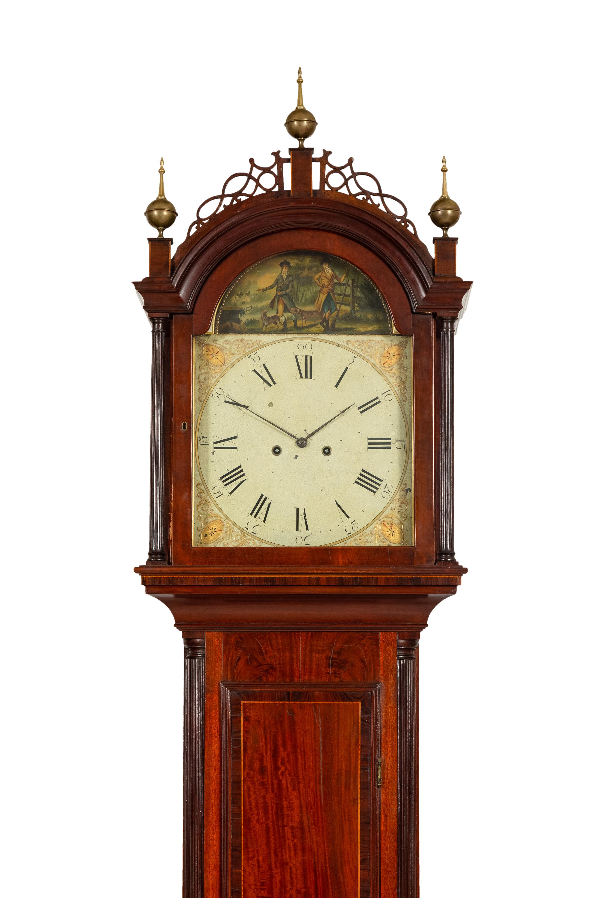 A Federal Carved, Inlaid and Figured Mahogany Tall Case Clock