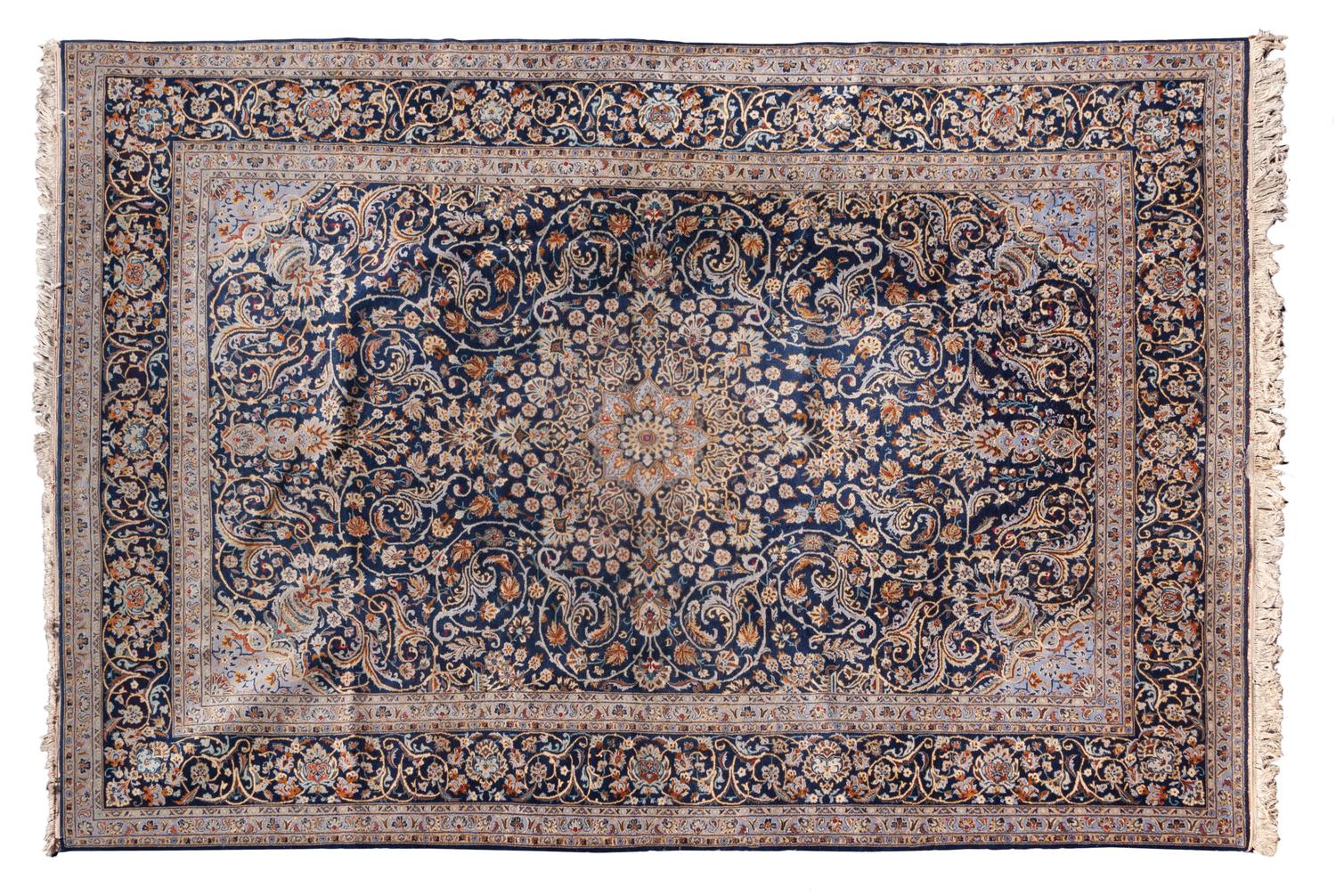 A Kashan Wool Rug 13 feet 10 inches x 10 feet 1 inch. — CIRCA 1950s