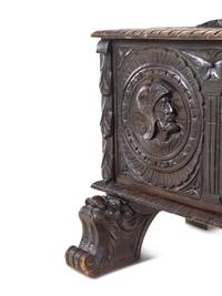 A Renaissance Revival Carved Walnut Chest